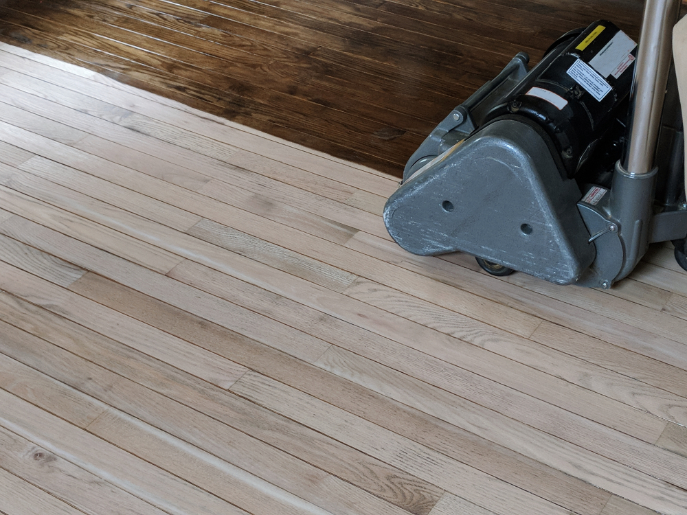 Sanding,hardwood,floor,with,the,grinding,machine